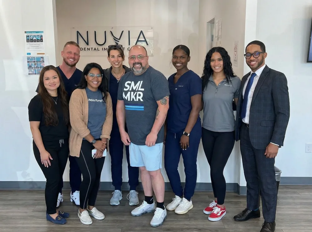 Blake Hundley with the Nuvia Dental Implant Center team